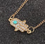 Gold Hamsa Hand Bracelet w/ Turquoise Stone